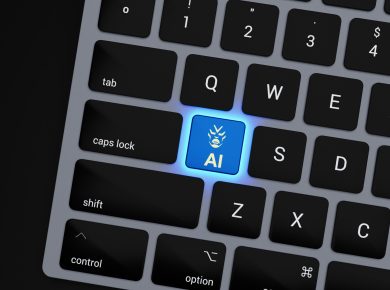 a close up of a keyboard with a blue button