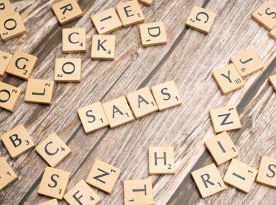 scrabble-letters-spelling-saas-on-a-wooden-tabl